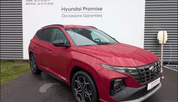 14100 : Hyundai Lisieux - Trajectoire Automobiles - HYUNDAI Tucson - Tucson - Sunset Red Métal - Transmission intégrale - Hybride rechargeable : Essence/Electrique