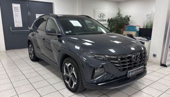95500 : Hyundai Gonesse - ABVV - HYUNDAI TUCSON Executive - TUCSON IV - Gris - Boîte automatique - Essence / Courant électrique