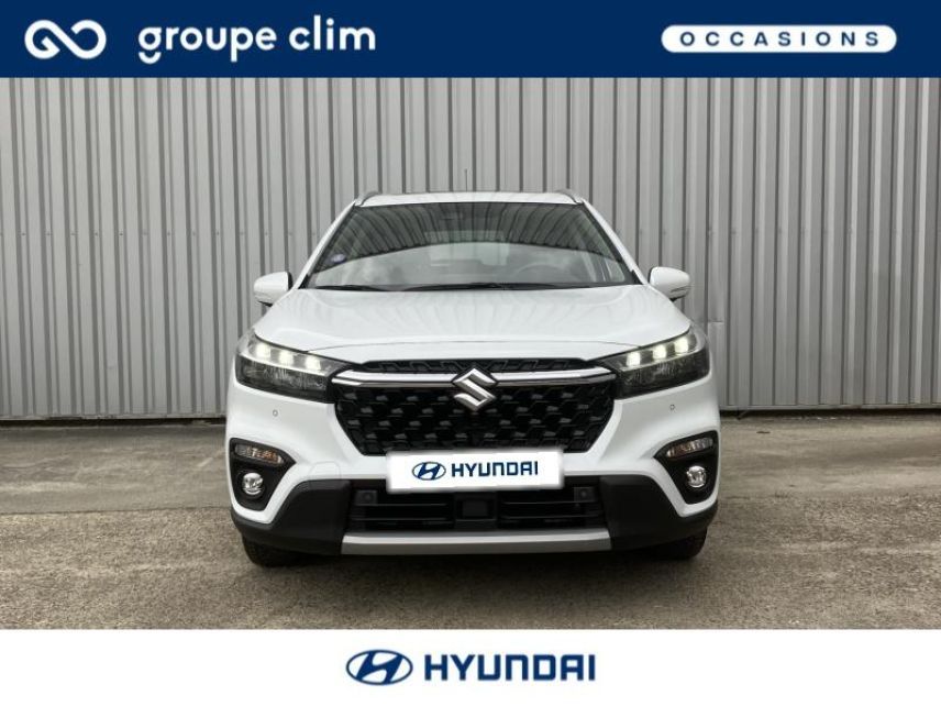 40990 : Hyundai Dax - i-AUTO - SUZUKI S-Cross - S-Cross - Cool White Pearl métallisé - Transmission intégrale - Hybride : Essence/Electrique