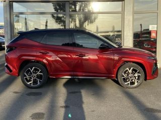 57200 : Hyundai Sarreguemines - Theobald Automobiles - HYUNDAI Tucson - Tucson - Ultimate Red Métal - Traction - Hybride : Essence/Electrique