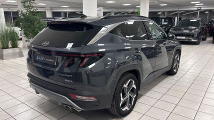 95500 : Hyundai Gonesse - ABVV - HYUNDAI TUCSON Executive - TUCSON IV - Gris - Boîte automatique - Essence / Courant électrique