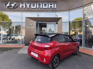 19100 : Hyundai Brive-la-Gaillarde - Garage Pouget - HYUNDAI i10 - i10 - Dragon Red Métal/Toit/rétros Black - Traction - Essence